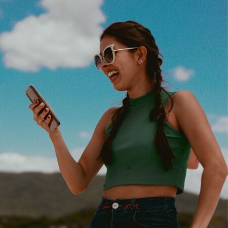 How To Be A Social Media Influencer In 2021 woman holding smartphone
