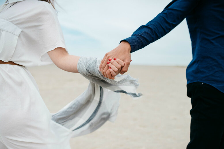 Couple holding hands Couple holding hands - childfree life married without kids