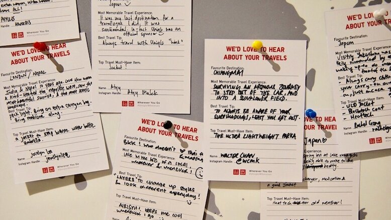 UNIQLO presents "Modest Travels" Notes with travel stories are pinned on a wall.
