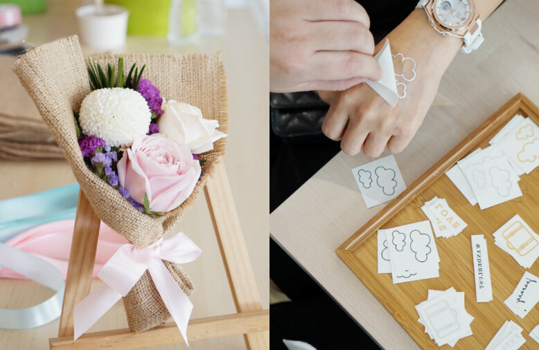 Floral bouquets and temporary tattoos On the left is a photo of a tiny floral bouquet; On the right is a photo of someone applying a temporary tattoo of clouds on her hand, plus a wooden plate full of other tattoos.