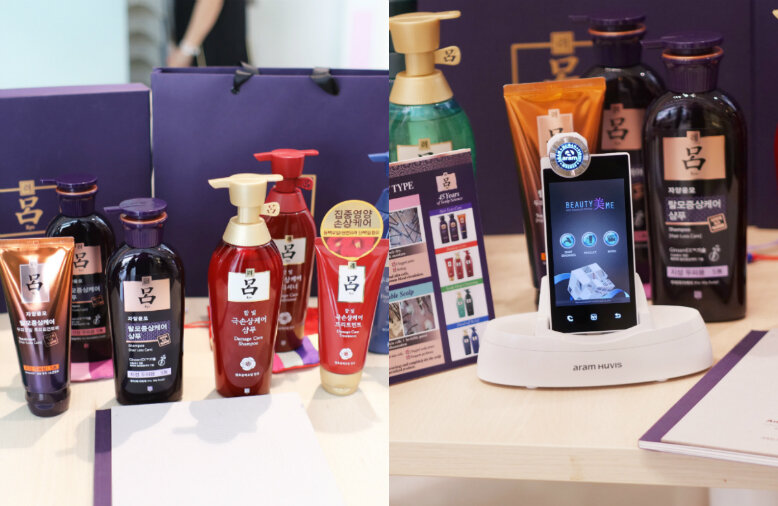 Hair analysis courtesy of Ryo On the left is a display of different haircare products; On the right is a mobile scalp analysis equipment on display.