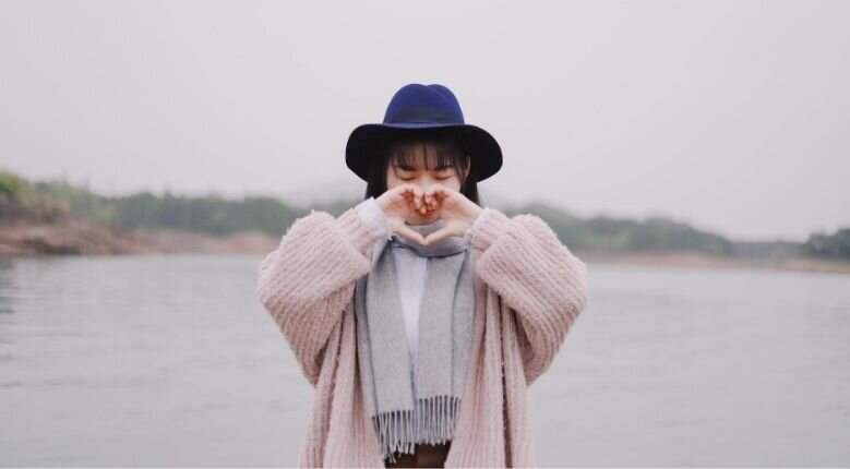 September 2020 Horoscope - Girl doing a heart shape with her hand September 2020 Horoscope - Girl doing a heart shape with her hand