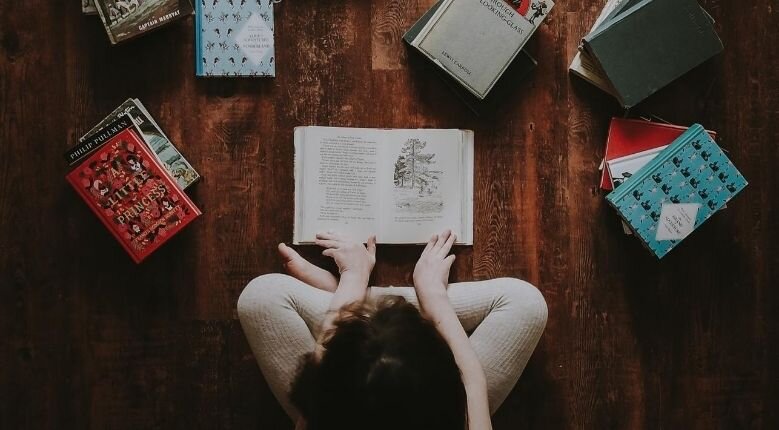 Girl reading young adult novels Girl reading young adult novels