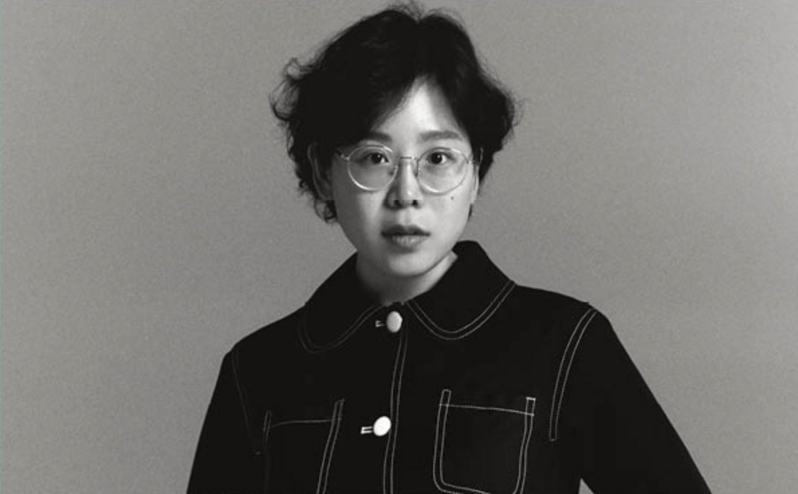 Minju Kim A black and white photo of a woman