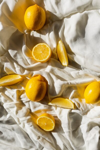 Orange slices on bedsheet