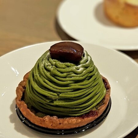 Image of a dessert crowned with matcha