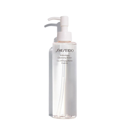 A transparent bottle with a white push cap filled with clear cleansing water.
