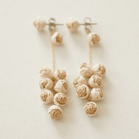 cotoyo matsue forest seeds pierced earrings in gold beige
