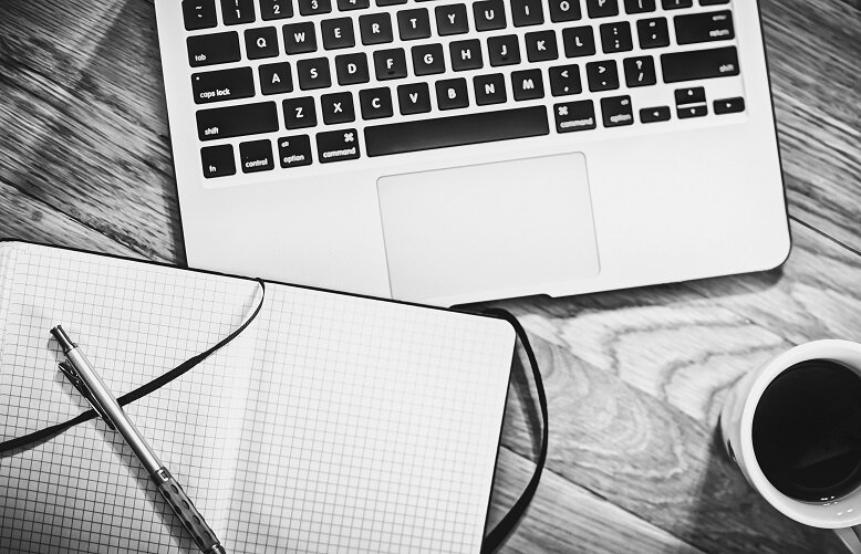 A notebook, pen, and laptop with coffee The Five Second Rule takes some commitment to do at the start.