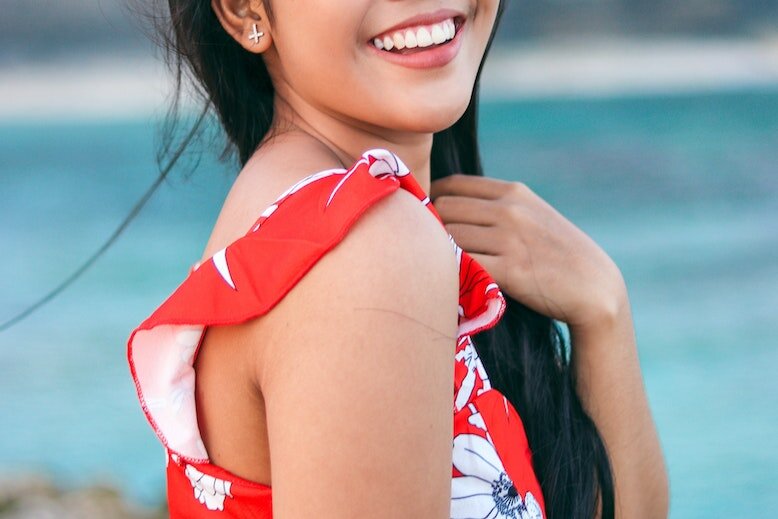 Woman with long hair smiling