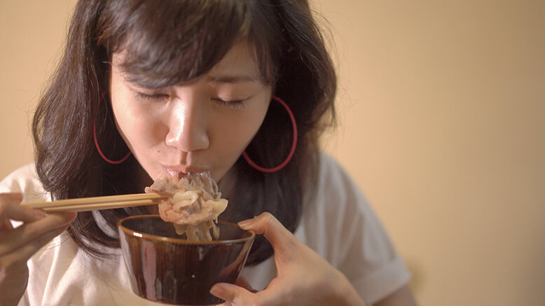 Woman tasting wagyu