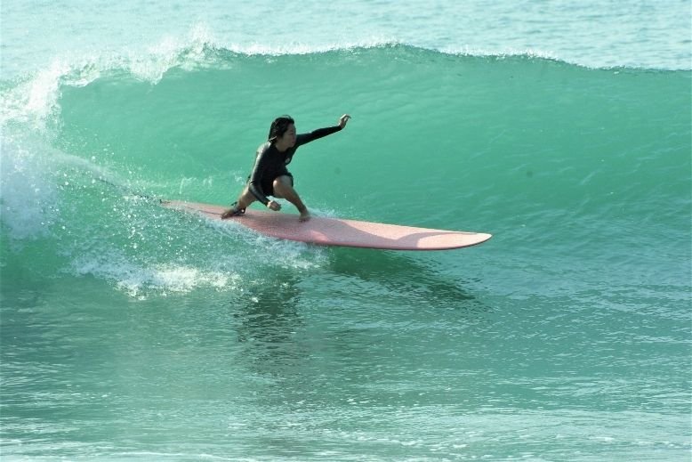 A man surfing in Irino Beach in Kochi Prefecture