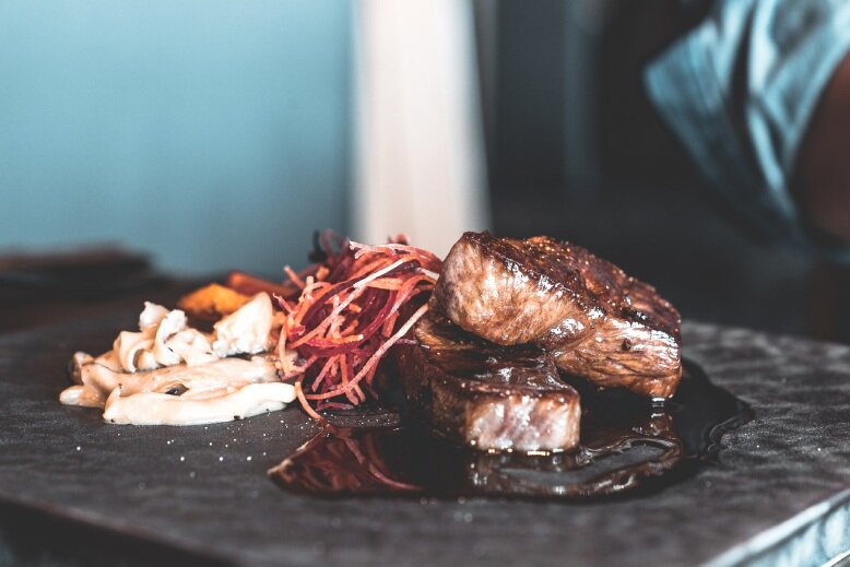 Sauteed wagyu with truffle glaze and seasonal vegetables