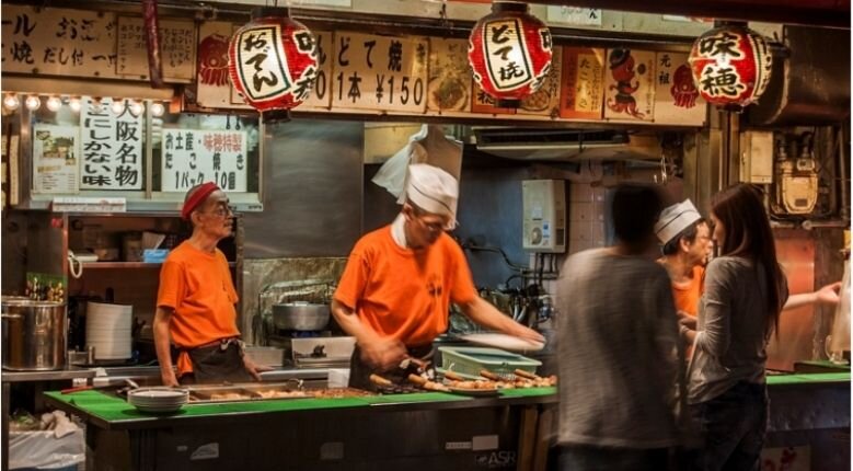 The warmth and aroma from an oden shop draws customers in seek of some comfort food, even during other seasons. 