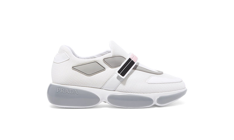 A white Prada logo embossed rubber and leather-trimmed mesh sneakers