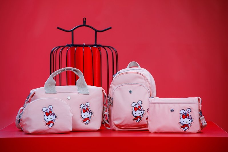 A group shot of the Kipling x Hello Kitty Rabbit Year Collection in Pink