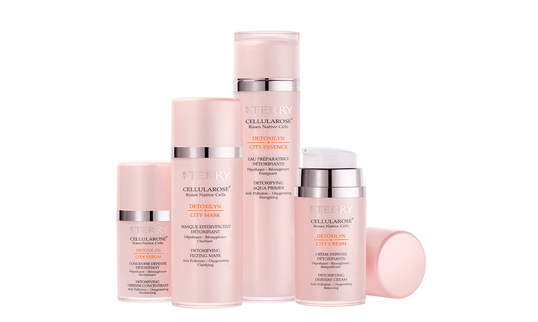 Skincare set with matching slightly transluscent light pink packaging.