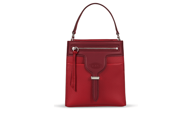 A red leather modified bucket bag with a crossbody strap.