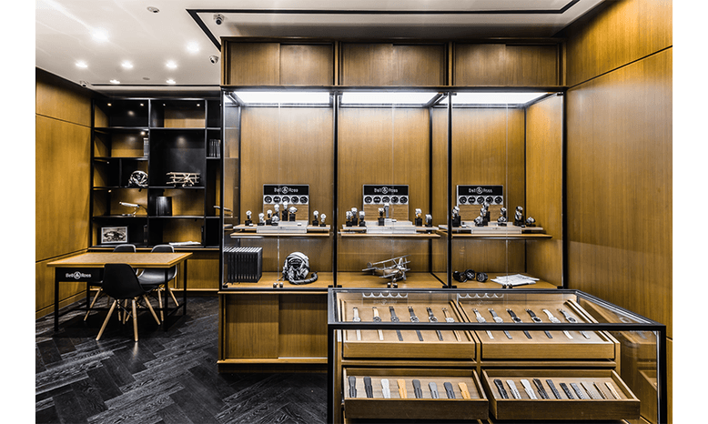 A boutique filled with glass displays of timepieces