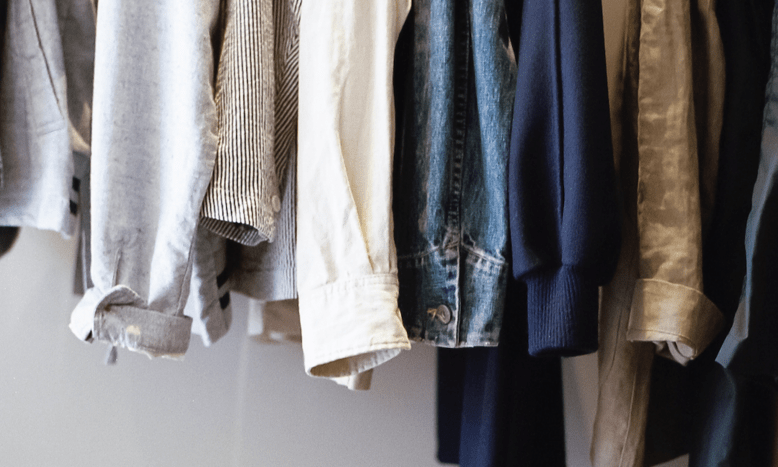 clothes hanged up on rack