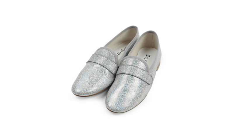 A pair of sparkly silver loafers